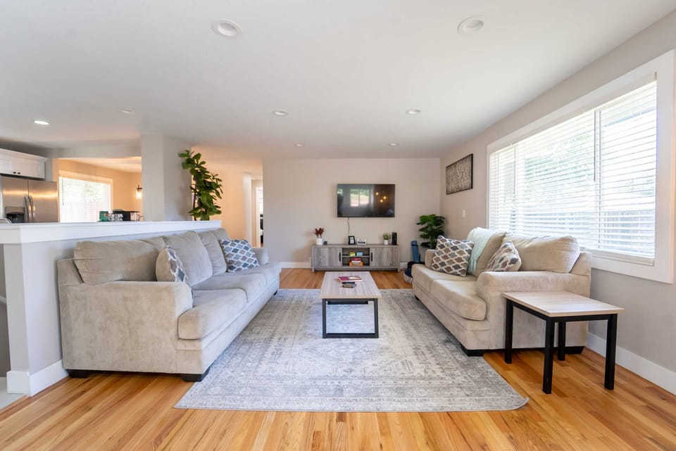 Living Room: Bright and airy space with plush seating and a view-perfect for relaxation or entertainment!