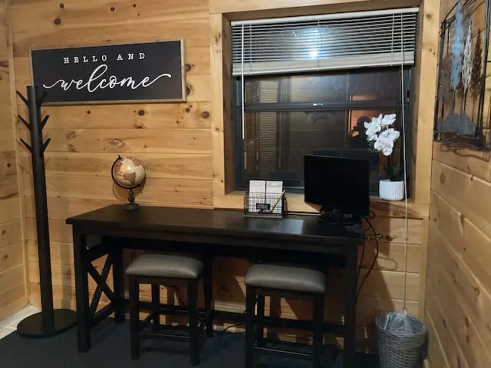 Office Space with large desk, computer monitor, and 3 chairs -  great internet. 