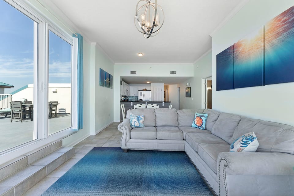 Seating in living room overlooks gulf.