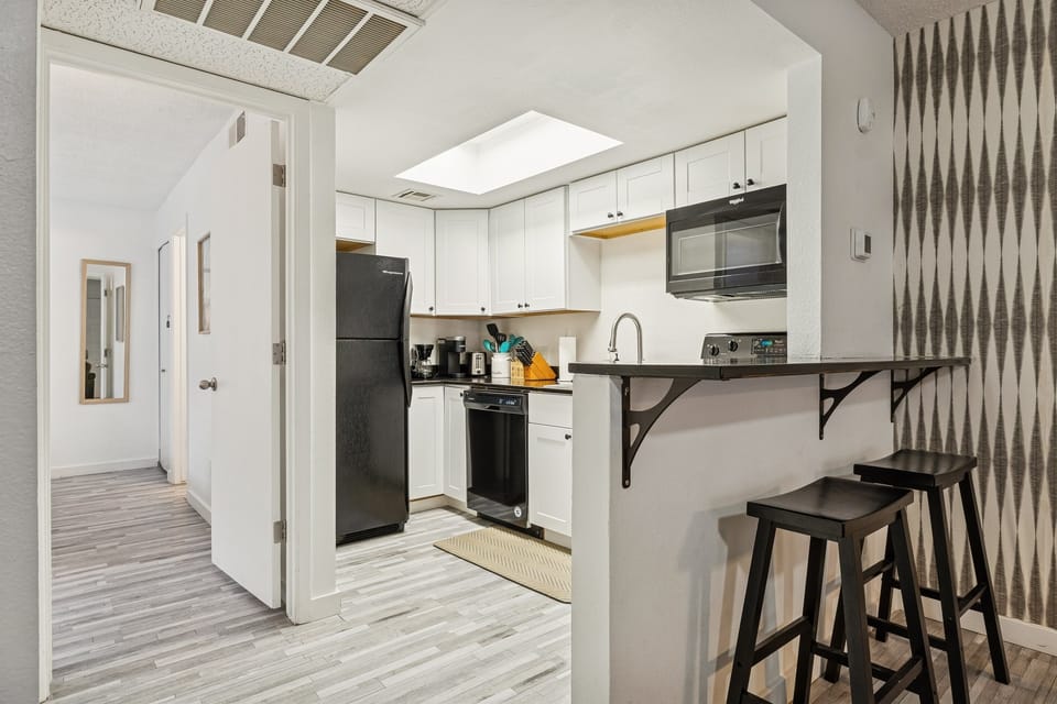 Save cash by preparing meals in your fully stocked kitchen. The high end butcher block counters were refinished in 1/2026.