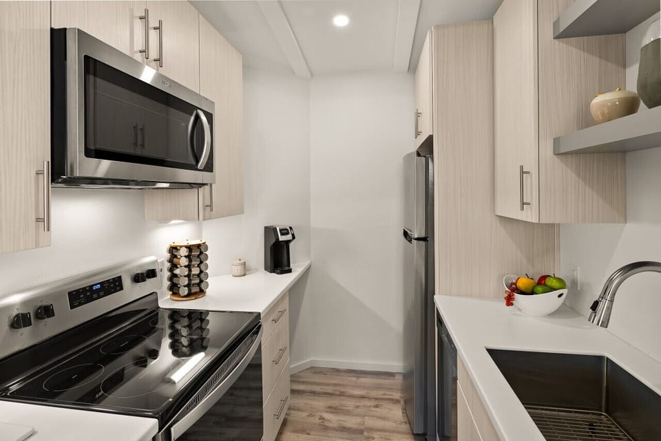 Fully equipped kitchen including blender, French press, drip coffee maker, toaster etc.
