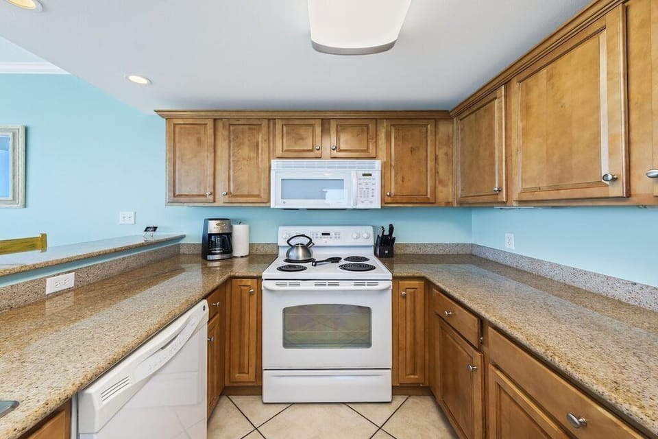 A full size kitchen is fully equipped for all your needs.