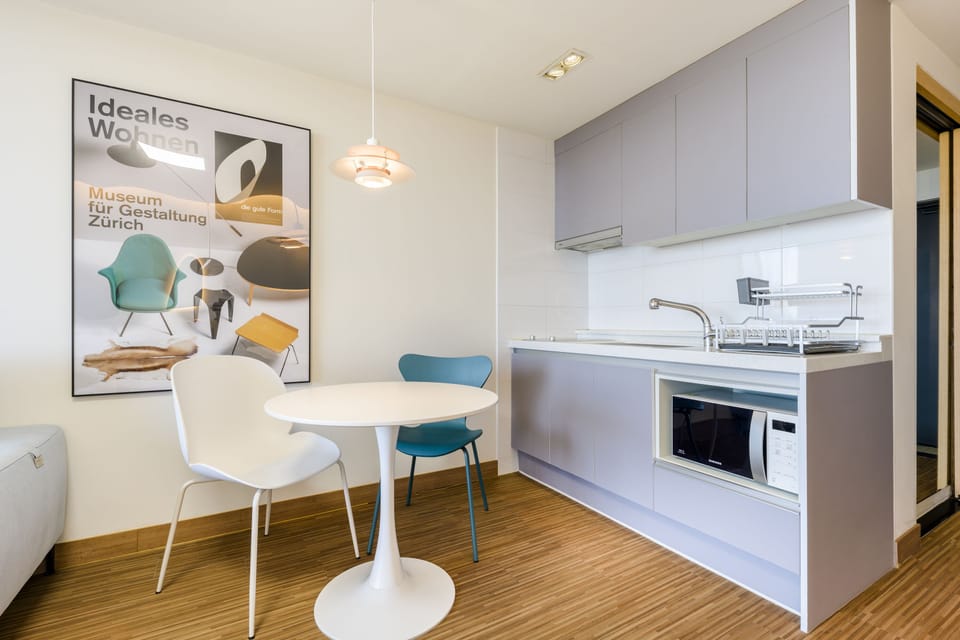 Duplex, 1 Queen Bed | Private kitchen | Fridge, microwave, stovetop, rice cooker