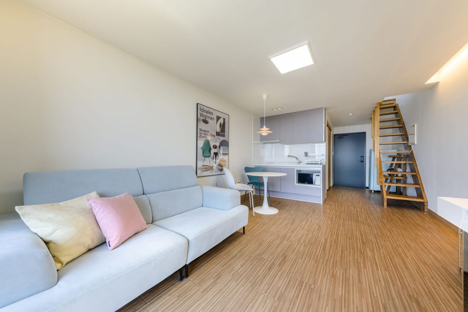 Duplex, 1 Queen Bed | Living area | TV