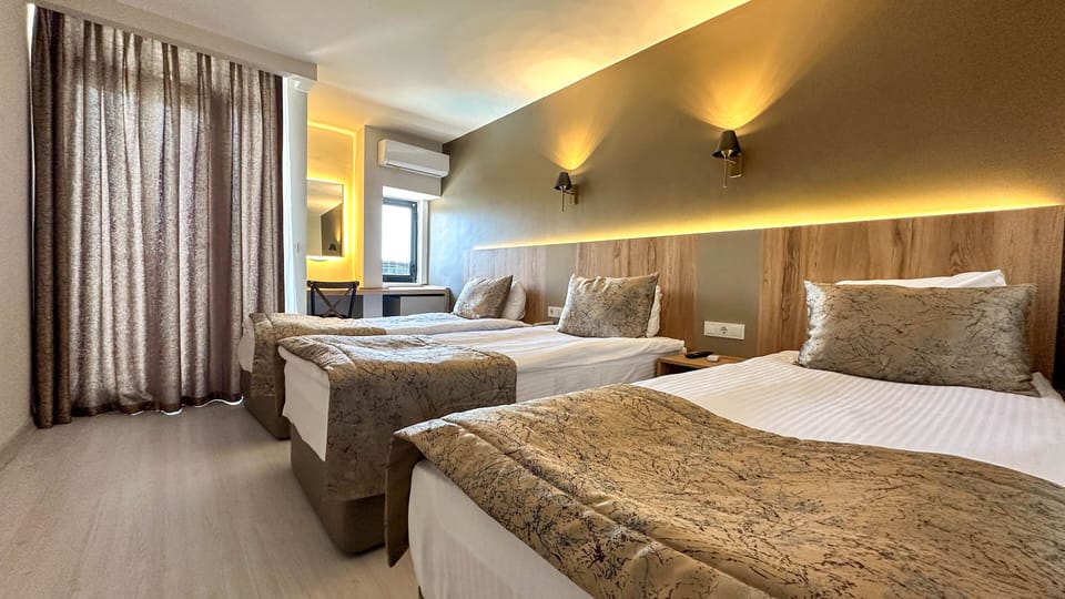 Standard Triple Room, 1 Bedroom, Pool View, Poolside | Premium bedding, minibar, in-room safe, desk