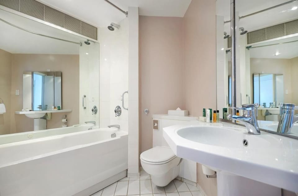 Combined shower/tub, hair dryer, towels, soap