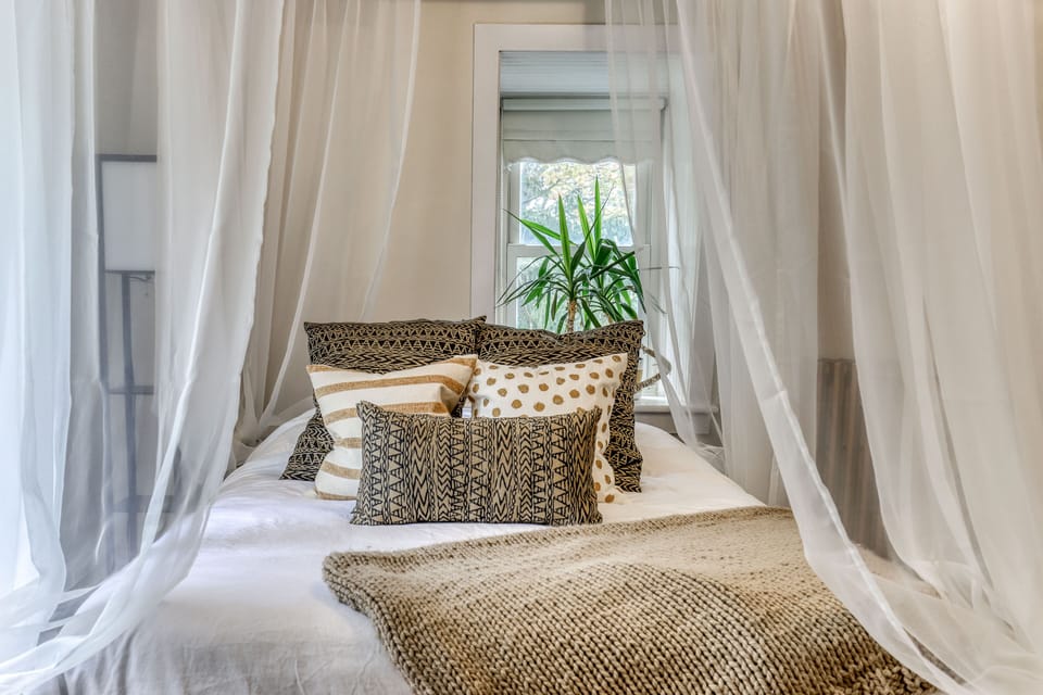 Africa Room | Premium bedding, pillowtop beds, individually decorated