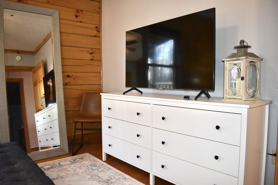 Smart TV in queen bedroom