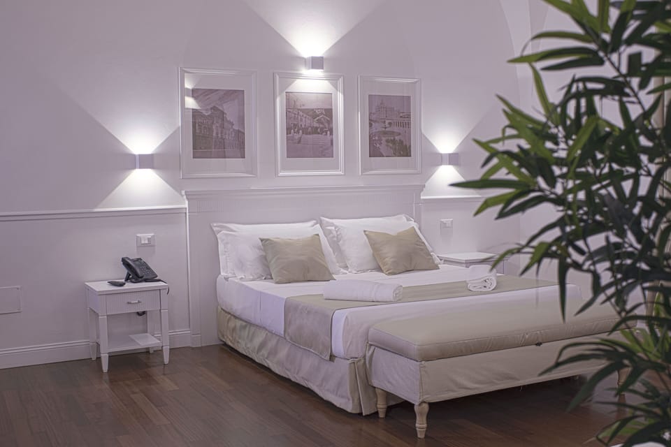 Hypo-allergenic bedding, down comforters, minibar, in-room safe