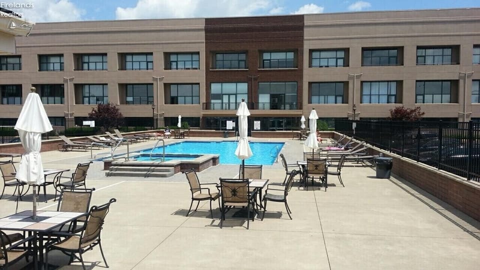 Heated pool with hot tub