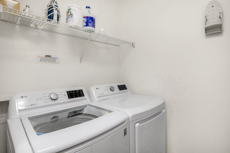 Laundry Room - Updated appliances - includes enough detergent and bleach for your whole week. Ironing board, iron, mop, broom and dust pan.