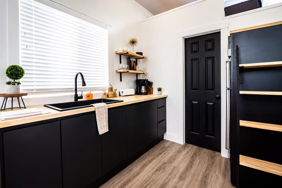 Prepare everything from a quick breakfast to a home-cooked dinner in the thoughtfully designed kitchen, complete with modern finishes and plenty of space for your vacation essentials.