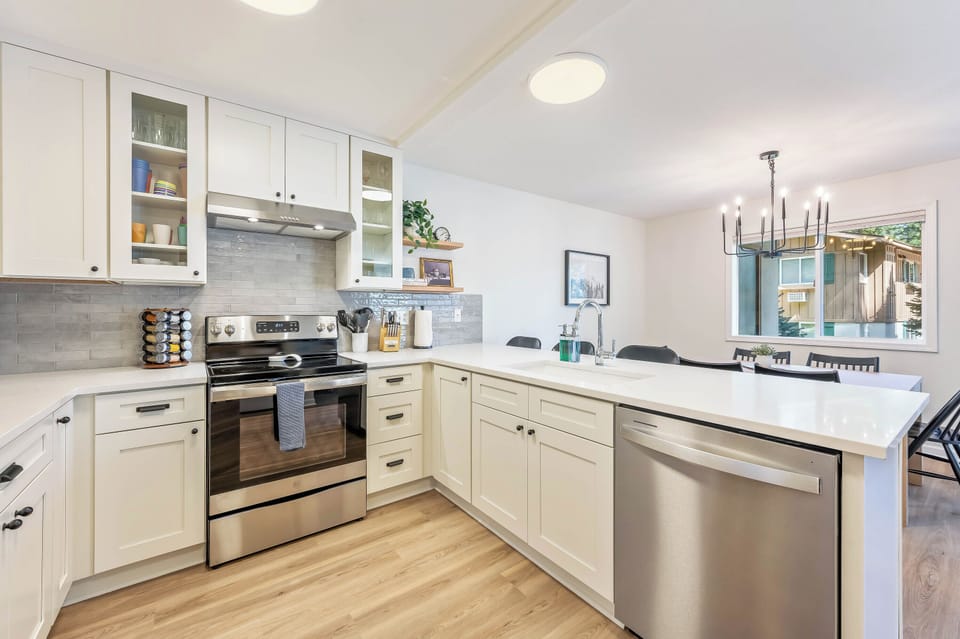 Fully equipped kitchen with stainless steel appliances and Quartz countertops