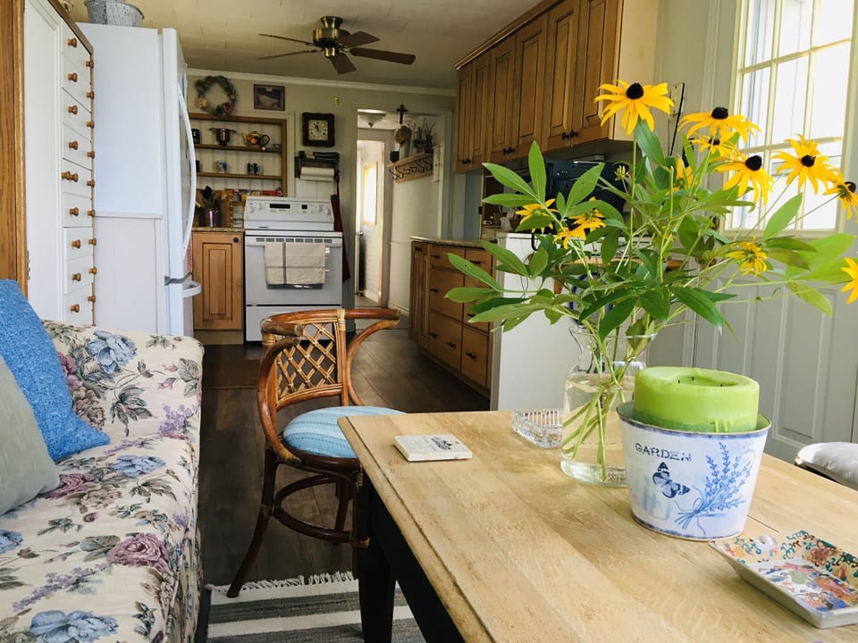 Open space between kitchen and living room for easy conversation.