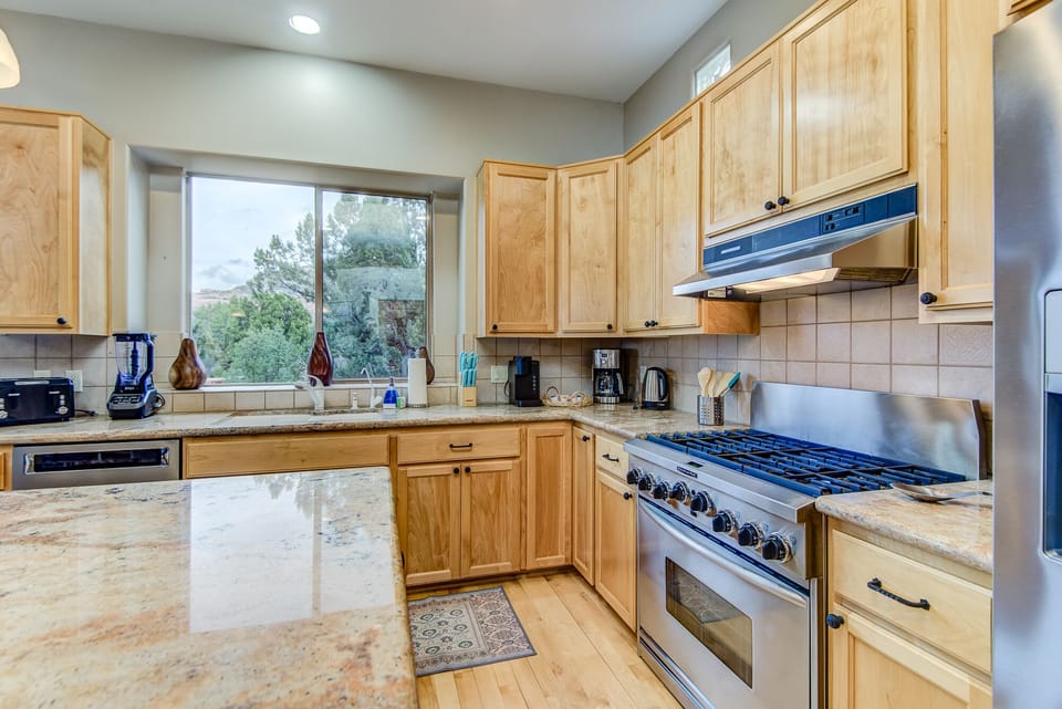 Fully Equipped Kitchen - Stone Counters and Stainless Appliances