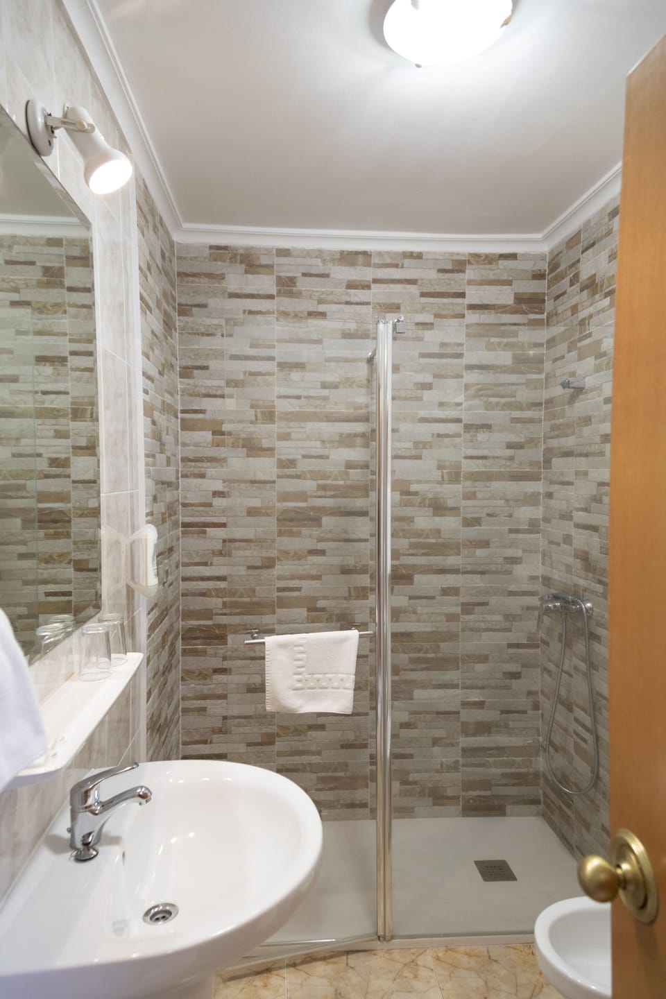 Family Quadruple Room | Bathroom | Hair dryer, bidet, towels