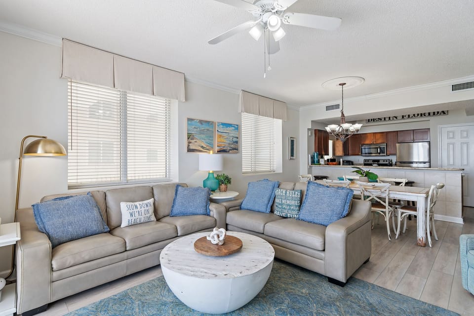 Living space features Gulf Views, Brand New leather furniture (which includes a Queen Sleeper Sofa) situated around a large Smart TV - come and relax!