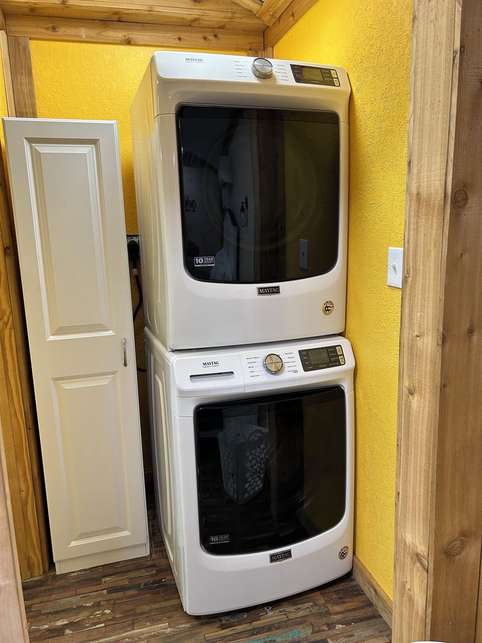 Washer and dryer. Closet holds towels and laundry supplies.