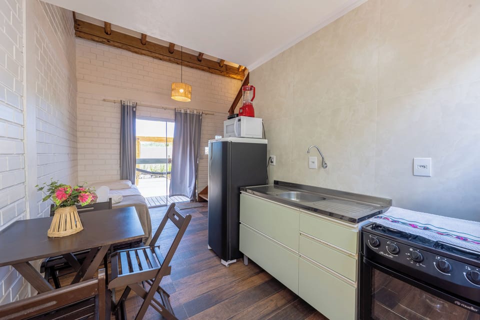 Deluxe Studio, Lanai | Private kitchen | Full-size fridge, microwave, oven, toaster