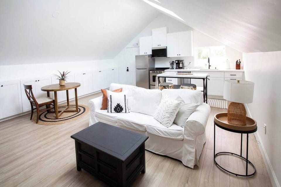 Spacious open room to cook and eat in the full kitchen, watch the 55' Smart TV,  relax, and have fun
