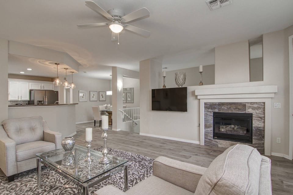 Main gathering room with flat screen tv and gas fireplace