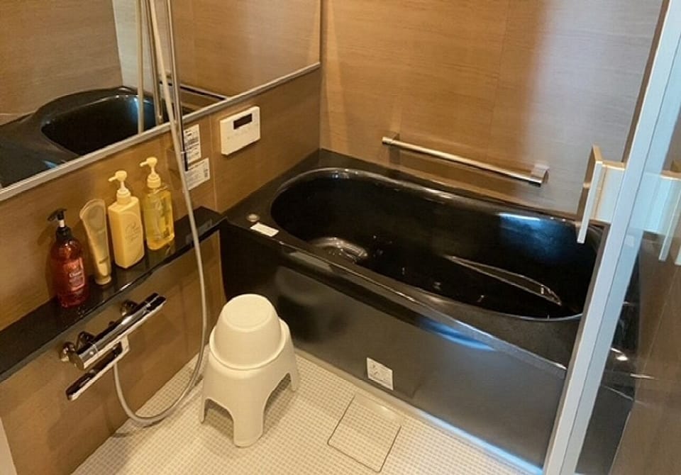 A large bathtub where you can stretch your legs and refresh yourself