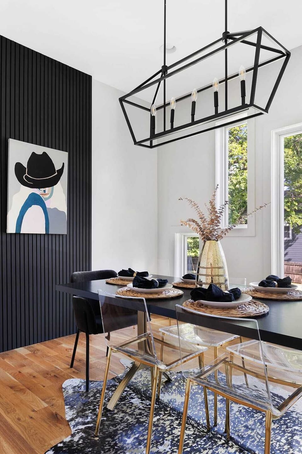 Stylish dining room adorned with locally inspired artwork.