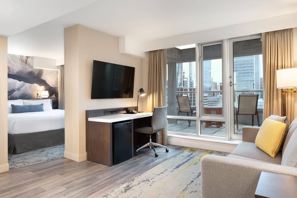Suite, 1 King Bed with Sofa bed, Balcony, City View | 1 bedroom, premium bedding, pillowtop beds, in-room safe