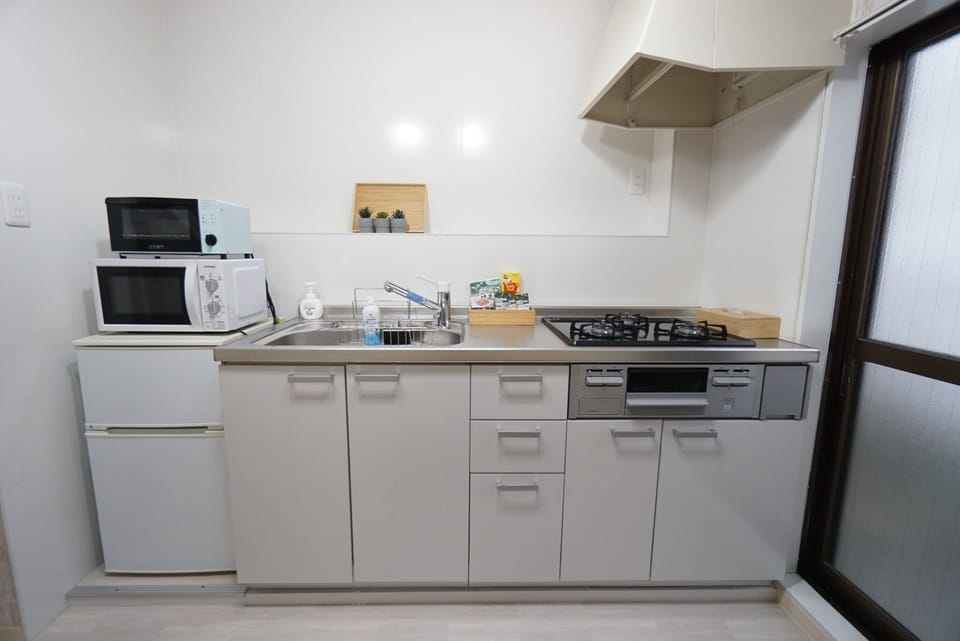 Kitchen refrigerator, microwave oven, toaster