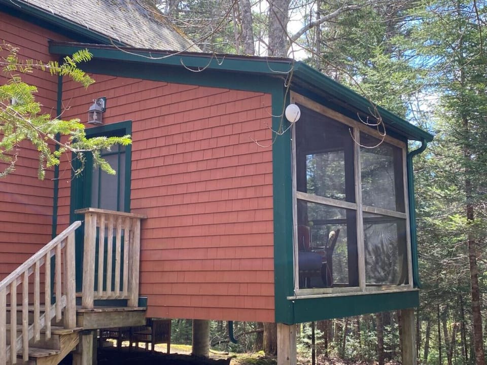 Enjoy the screened in porch, surrounded by nature