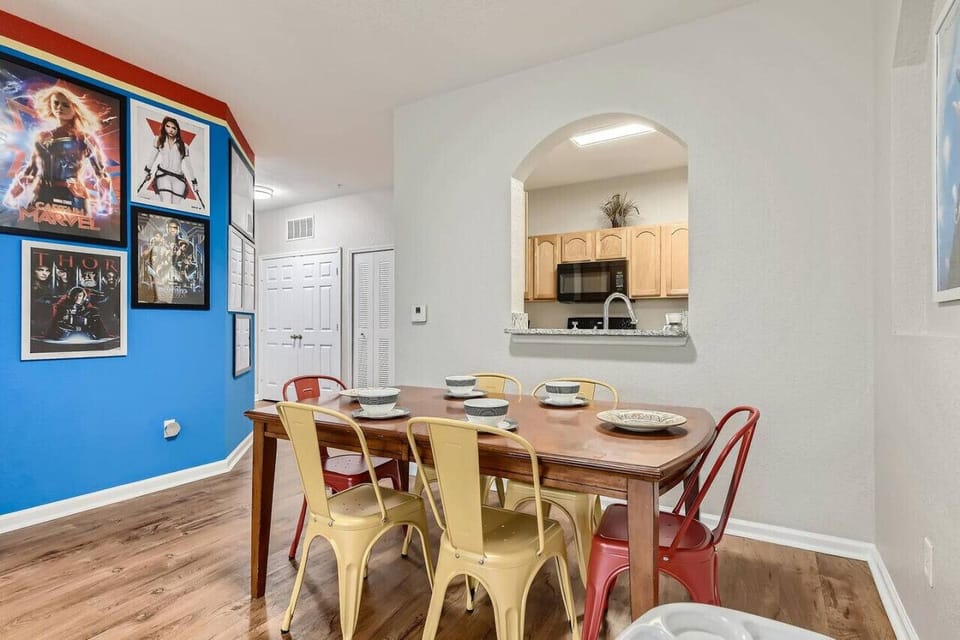 Dining room with eye-catching wall décor.