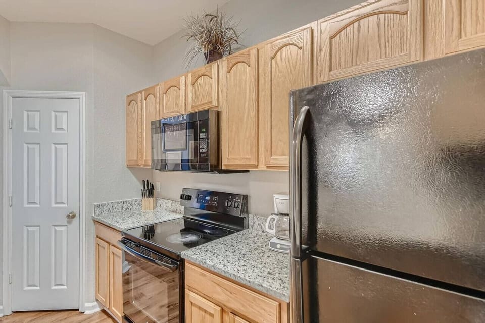 Kitchen area featuring essential appliances.