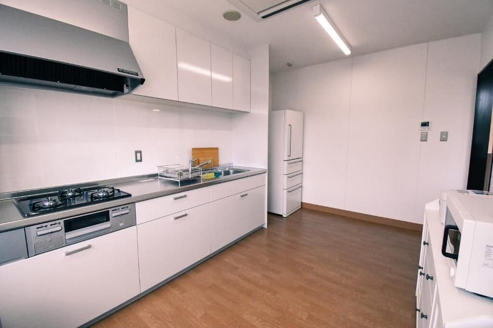 Full-size fridge, microwave, stovetop, toaster