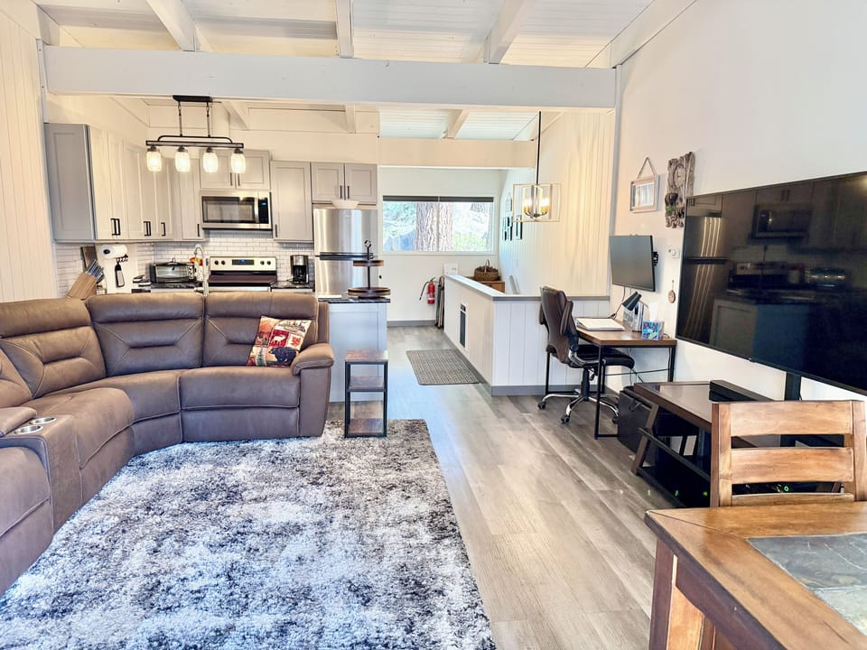 Kitchen opens to the great room - TV with cable and streaming & work station