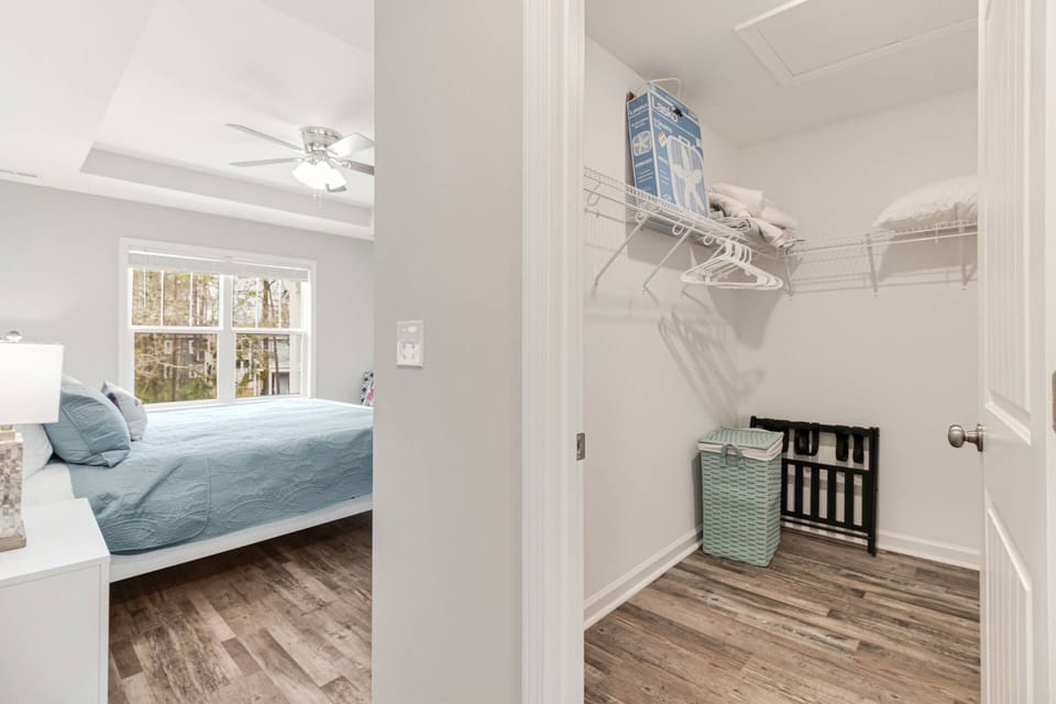 Large walk in closet in the primary bedroom for easy storage for your stay. 10 hangers supplied and a luggage rack. Laundry hamper in the corner.