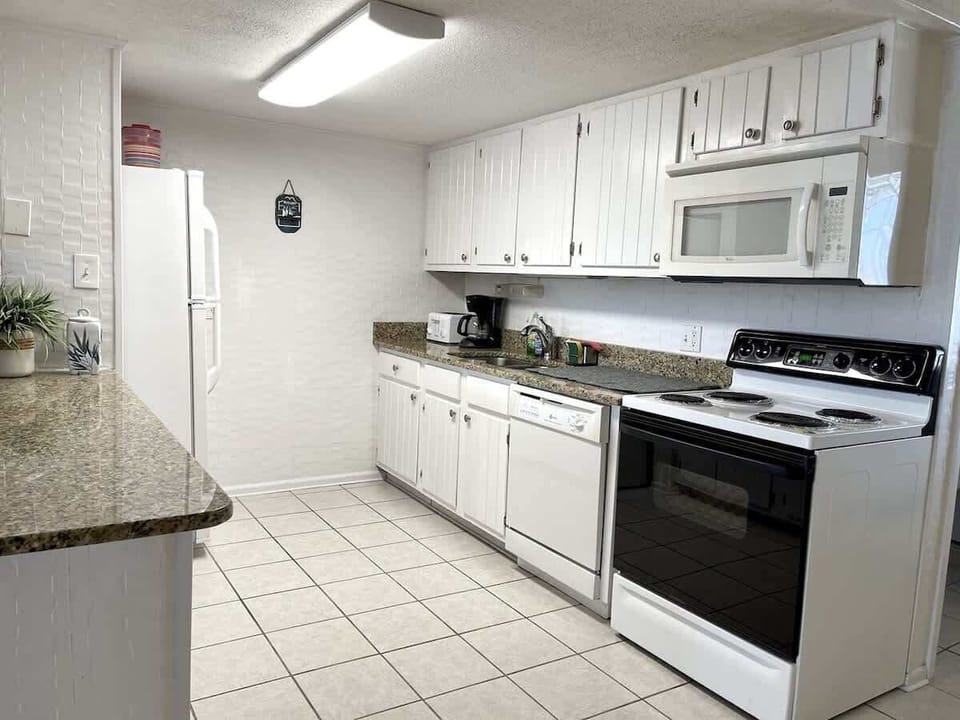 Spacious layout and full cookware set for meals made easy.

