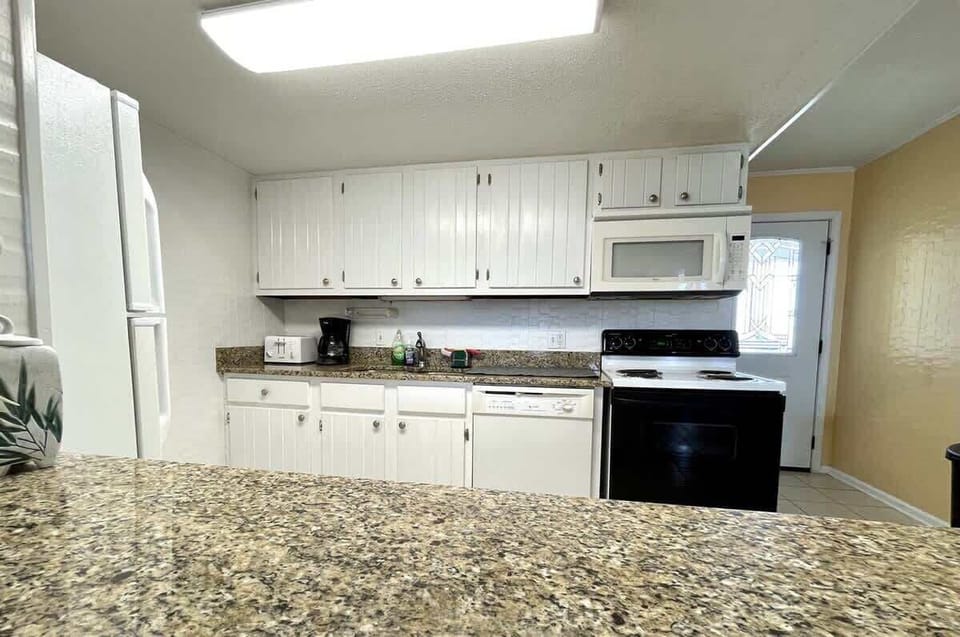Spacious layout and full cookware set for meals made easy.

