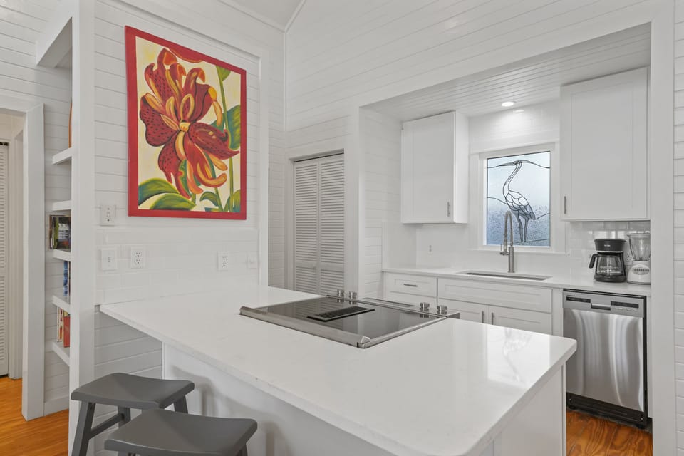 RENOVATED KITCHEN W/BAR SEATING FOR TWO