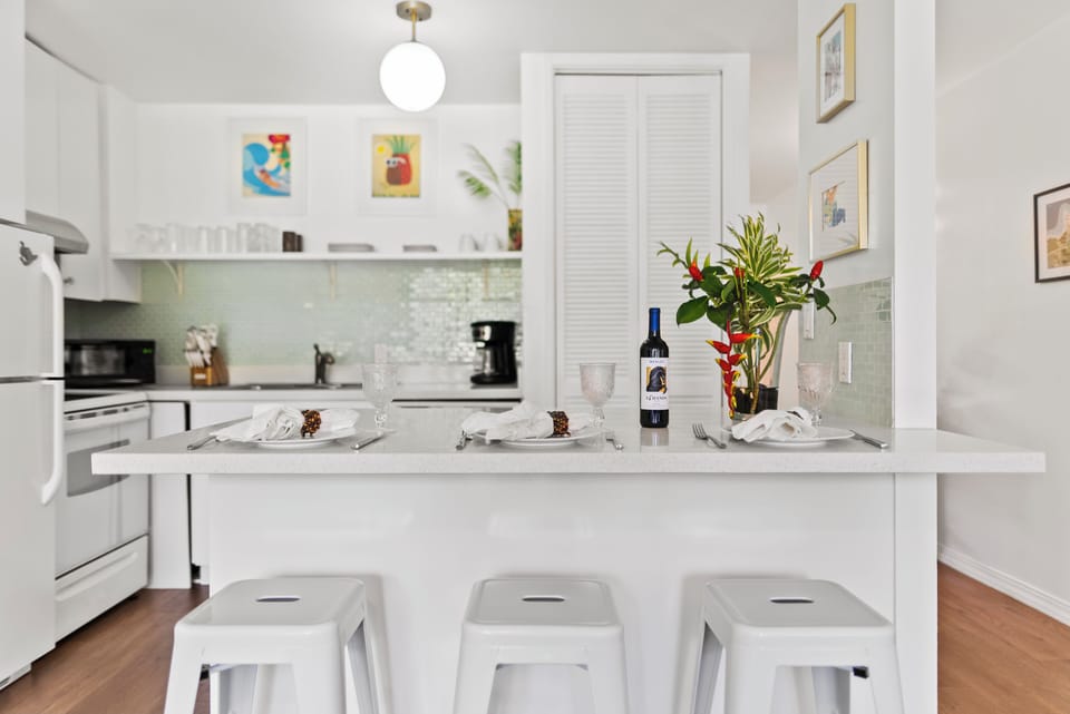 Kitchen bar top with seating for three.
