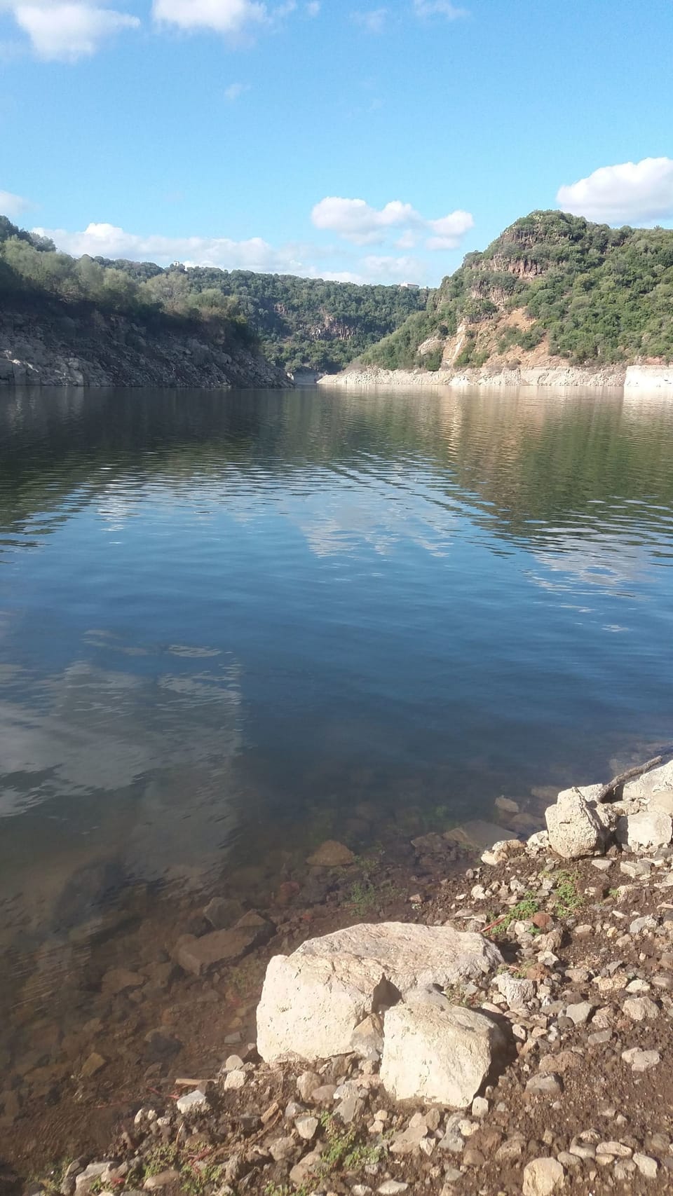 Private beach, black sand, sun loungers, beach umbrellas