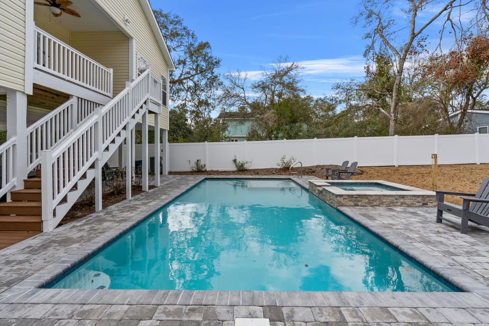 Take a dip in this sparkling pool after a fun day at the beach!