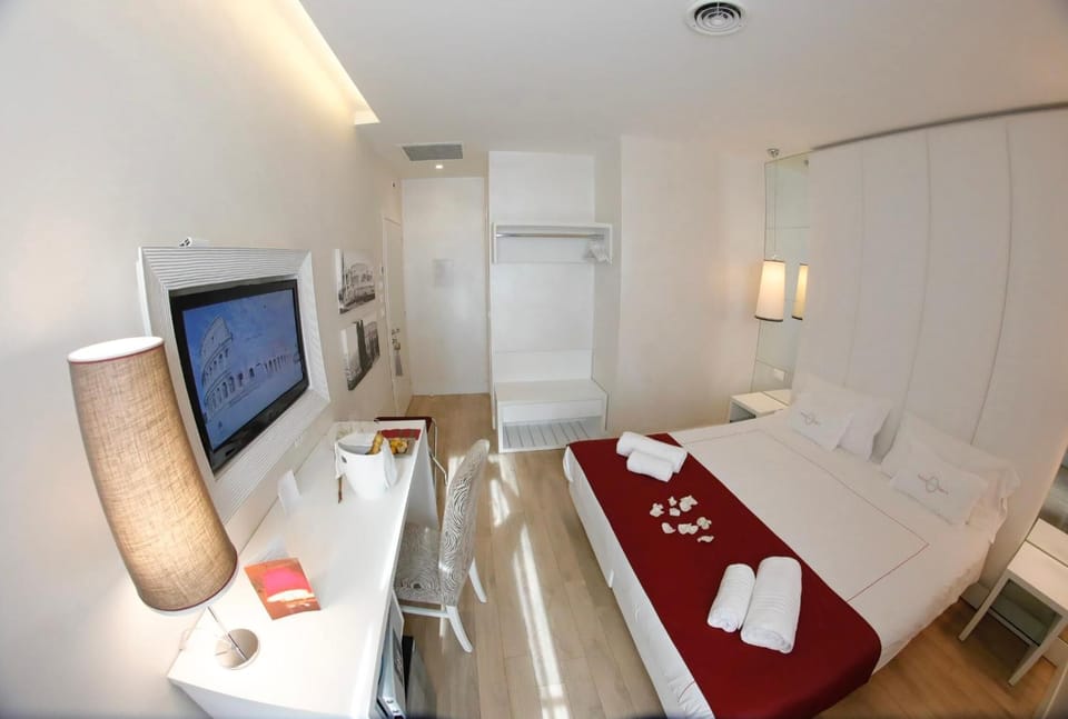 Premium bedding, down comforters, pillowtop beds, minibar