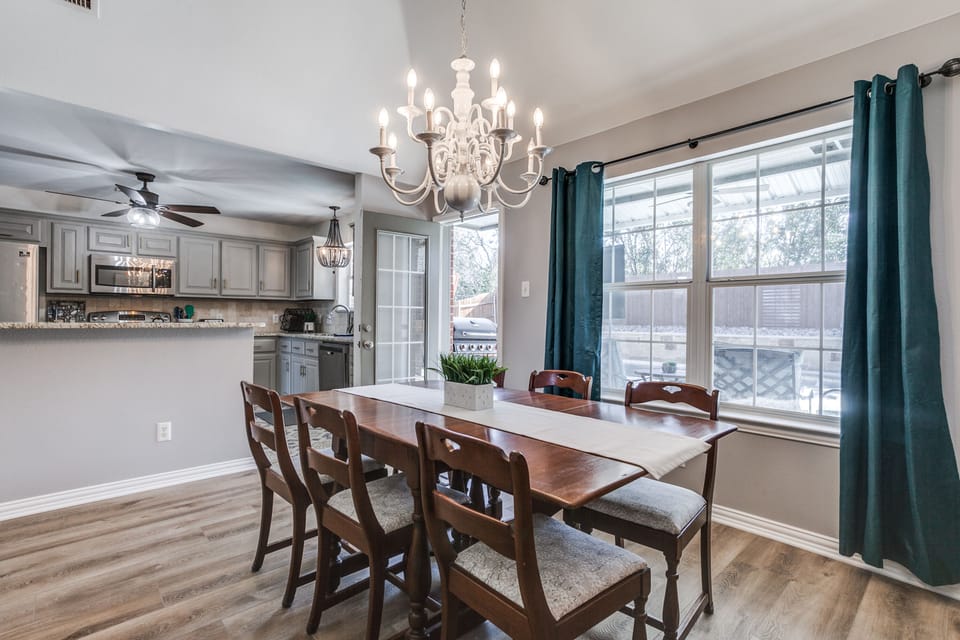 Nice dining area with view of the backyard and pool