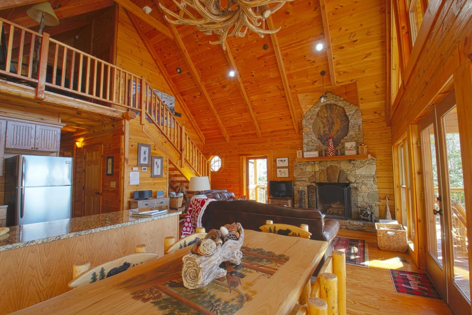The open concept floor plan connects your group across the living areas.