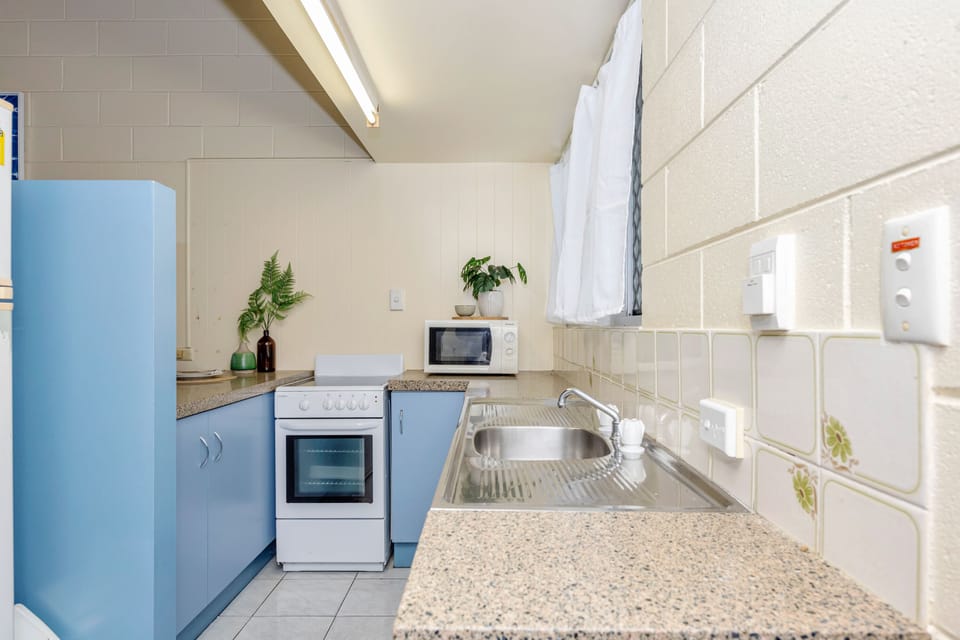 Classic Apartment | Private kitchen | Fridge, microwave, oven, stovetop