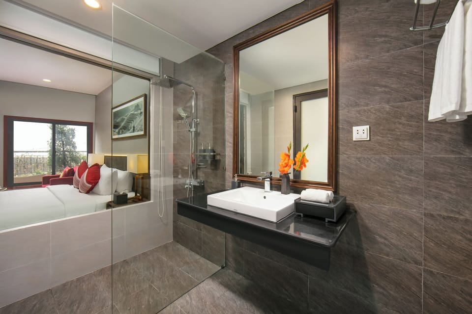 Shower, hydromassage showerhead, designer toiletries, hair dryer