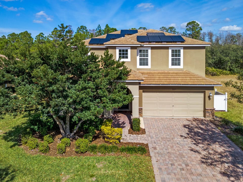Immaculately kept home with empty lot beside it/ conservation behind for privacy