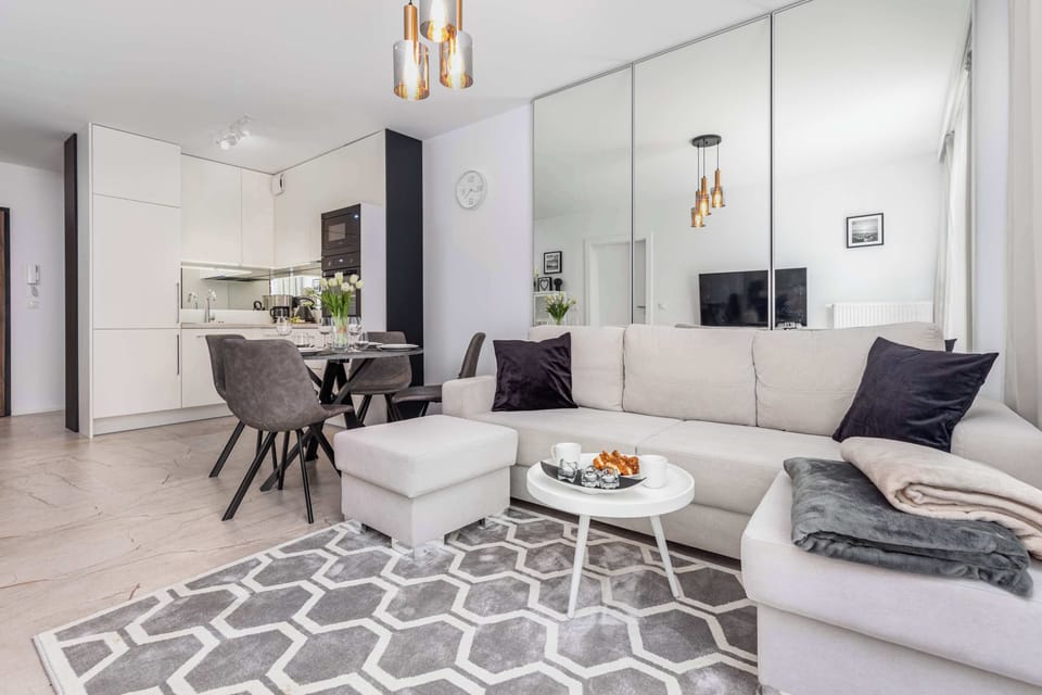 The elegant living room combined with the kitchenette is 
the perfect space for relaxing and spending time with loved ones. 