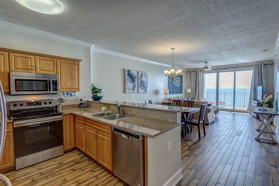 Kitchen is open to the living room and these amazing views