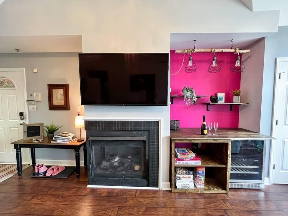 A gas fire place, beverage fridge, and slipper models, oh my. 